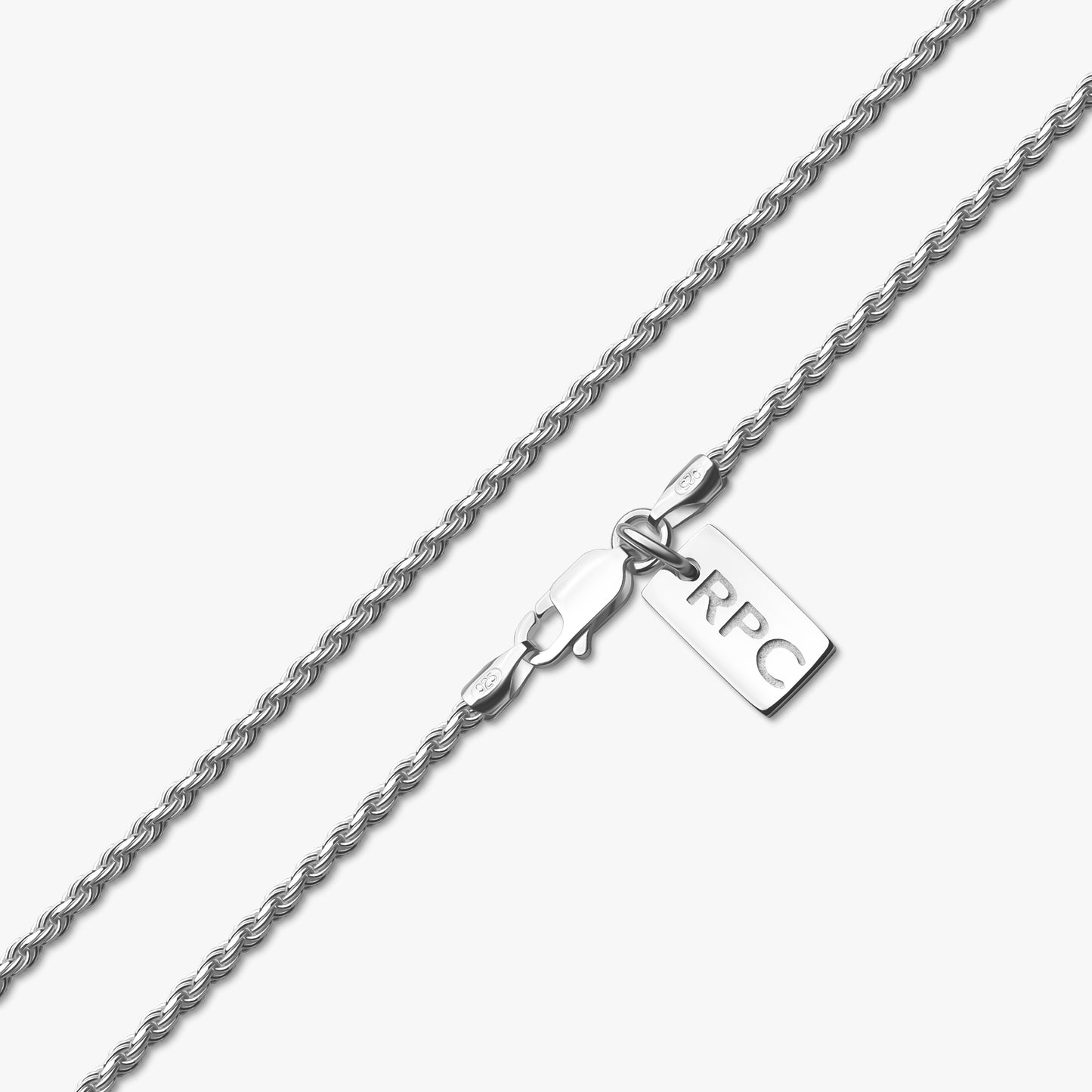 close up detail of 1.8mm sterling silver diamond cut rope chain with rahul patel collection tag