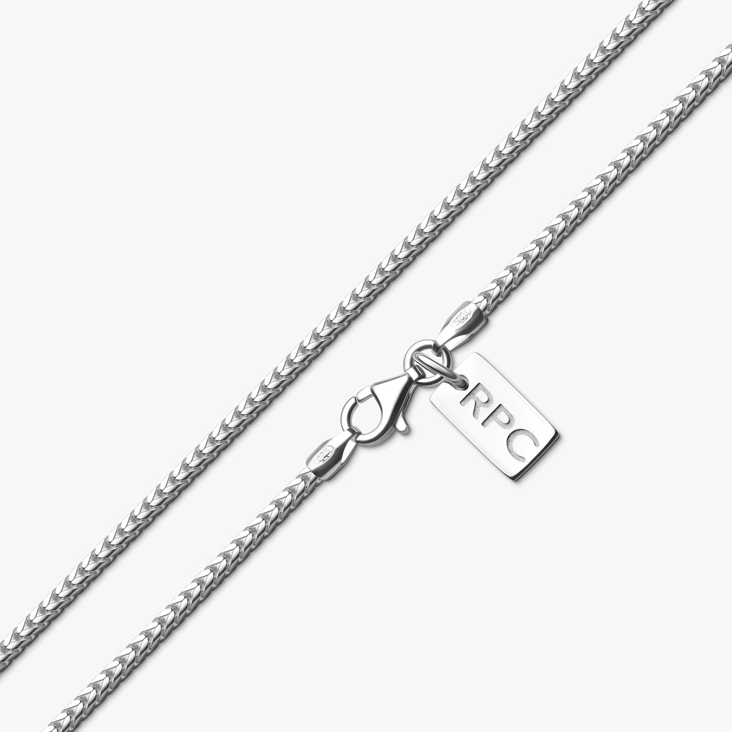 close up detail of 1.8mm sterling silver franco chain with rahul patel collection tag