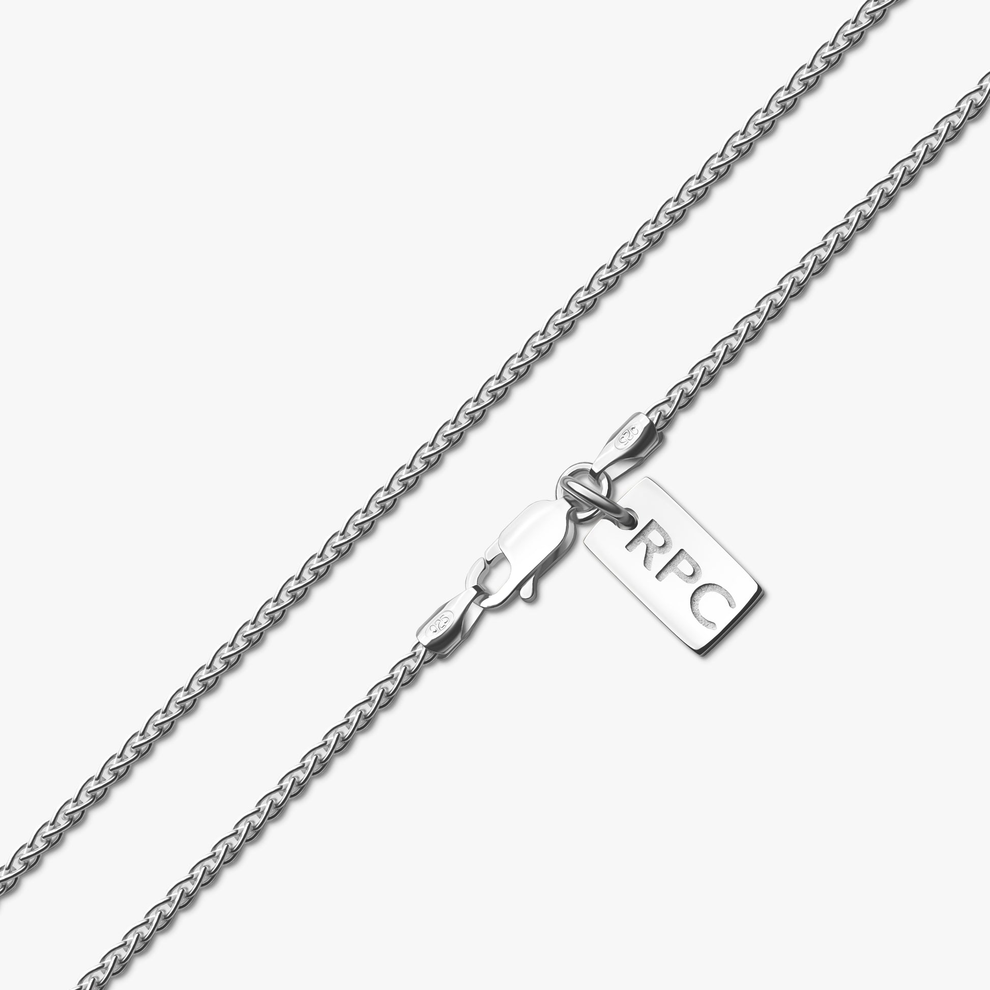 close up detail of 1.9mm sterling silver spiga wheat chain with rahul patel collection tag