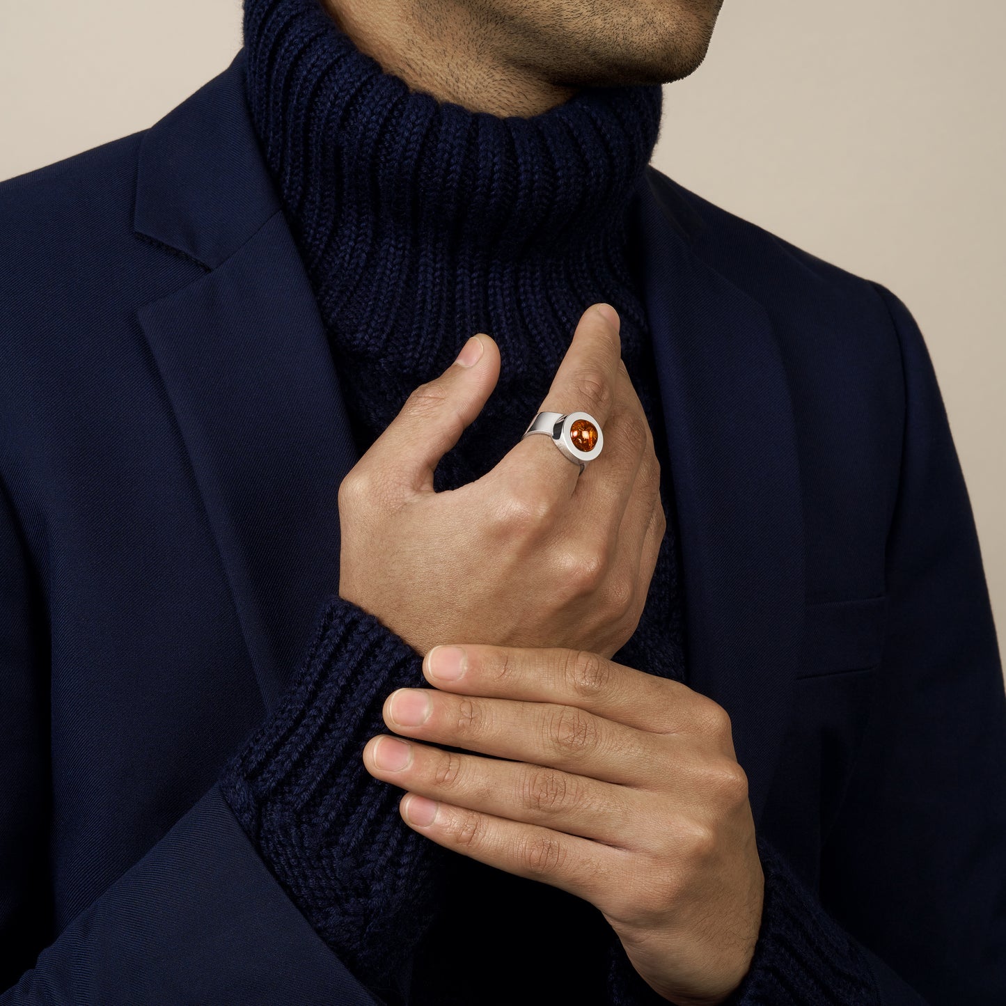 model wearing amber ring in sterling silver