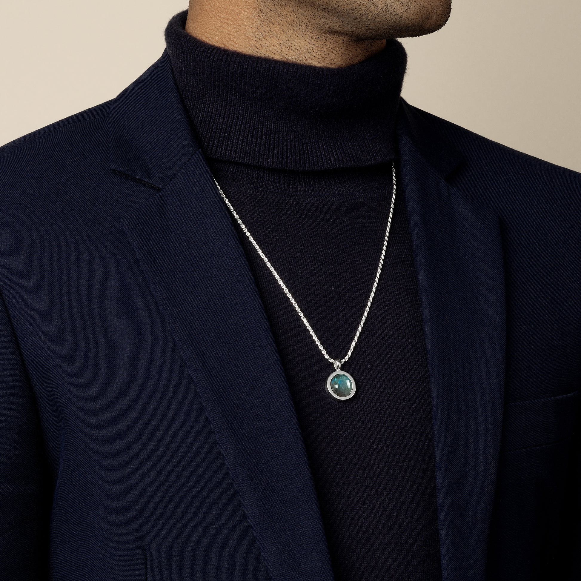 model wearing labradorite amulet pendant with 1.8mm diamond cut rope chain in sterling silver